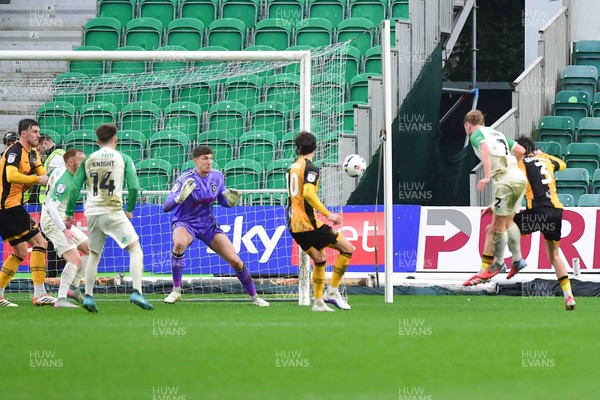 210226 - Newport County v Cambridge United - Sky Bet League 2 - Liam Bennett of Cambridge United scores their first goal with a header