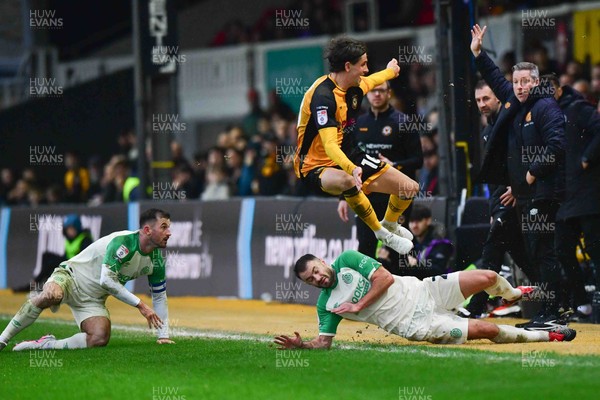 210226 - Newport County v Cambridge United - Sky Bet League 2 - Harrison Biggins of Newport County avoids a challenge