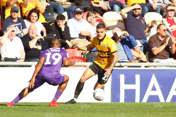 190918 Newport County v Cambridge United - Sky Bet League 2 - Tyler Forbes of Newport County takes on Reggie Lambe of Cambridge United  