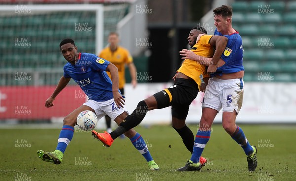020319 - Newport County v Carlisle United - SkyBet League Two - Jamille Matt of Newport County is held back by Anthony Gerrard of Carlisle United