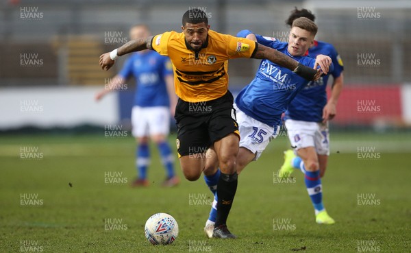 020319 - Newport County v Carlisle United - SkyBet League Two - Joss Labadie of Newport County is challenged by Regan Slater of Carlisle United