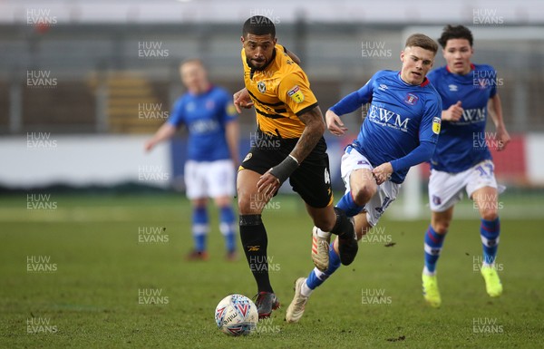 020319 - Newport County v Carlisle United - SkyBet League Two - Joss Labadie of Newport County is challenged by Regan Slater of Carlisle United