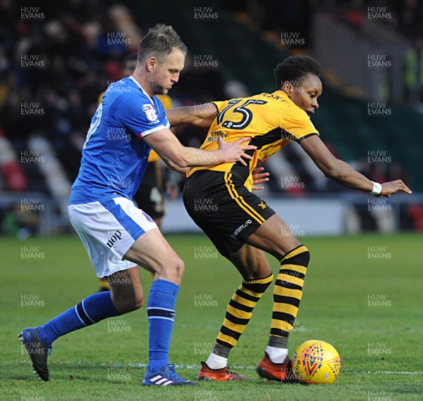 091217 - Newport County v Carlisle United Sky Bet League 2 -  Newport County's Shawn McCoulsky holds off Gary Liddle