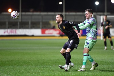 110225 - Newport County v Carlisle United - Sky Bet League 2 - Shane McLoughlin of Newport County is challenged by Terell Thomas of Carlisle United 