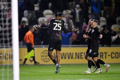 110225 - Newport County v Carlisle United - Sky Bet League 2 - Kyle Hudlin of Newport County celebrates scoring the opening goal with team mates 