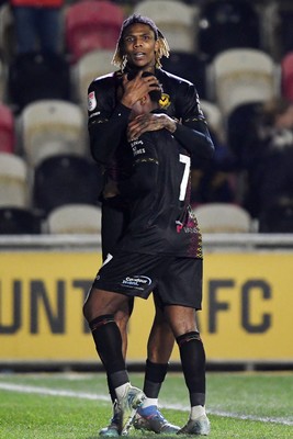 110225 - Newport County v Carlisle United - Sky Bet League 2 - Kyle Hudlin of Newport County celebrates scoring the opening goal with team mates 