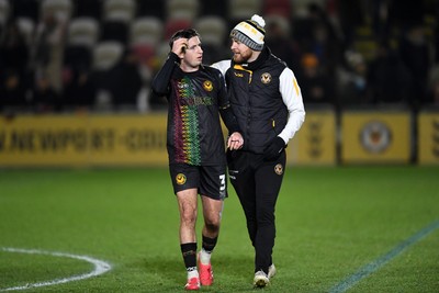 110225 - Newport County v Carlisle United - Sky Bet League 2 - Anthony Glennon of Newport County with Mark O’Brien celebrating the win at full time  