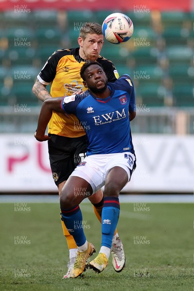 130421 - Newport County v Carlisle United - SkyBet League Two - Scot Bennett of Newport County is challenged by Offrande Zanzala of Carlisle United