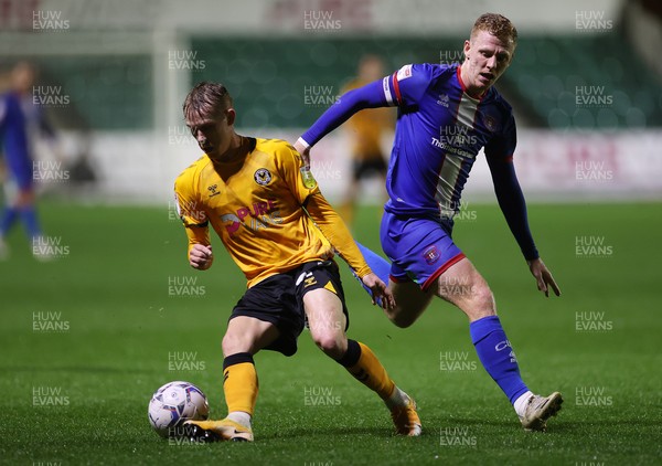 191021 - Newport County v Carlisle United - SkyBet League Two - Ollie Cooper of Newport County is challenged by Callum Guy of Carlisle