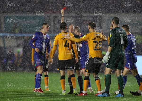 191021 - Newport County v Carlisle United - SkyBet League Two - Edward Upson of Newport County is given a red card by referee David Rock