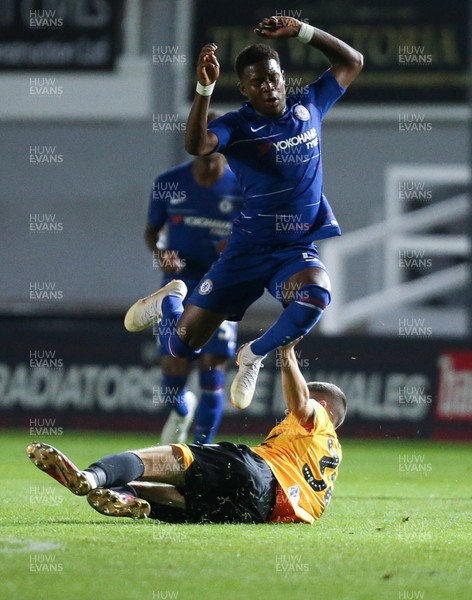 250918 - Newport County v Chelsea FC U21, Checkatrade Trophy - Daishawn Redan of Chelsea U21s jumps out of the tackle from Lewis Collins of Newport County