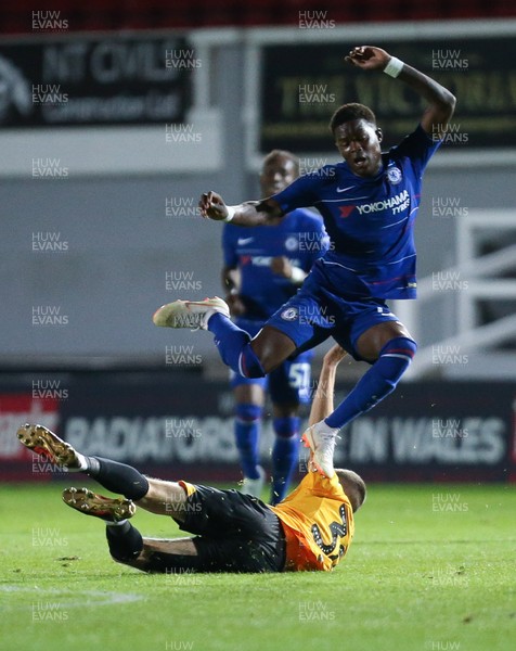 250918 - Newport County v Chelsea FC U21, Checkatrade Trophy - Daishawn Redan of Chelsea U21s jumps out of the tackle from Lewis Collins of Newport County