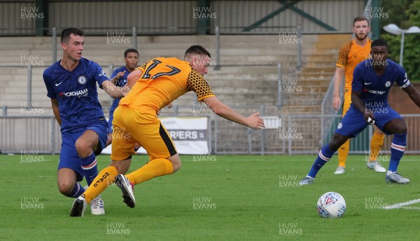240719 - Newport County v Chelsea U23s, Pre-season Friendly - Dom Jefferies of Newport County is brought down in the penalty box for a penalty