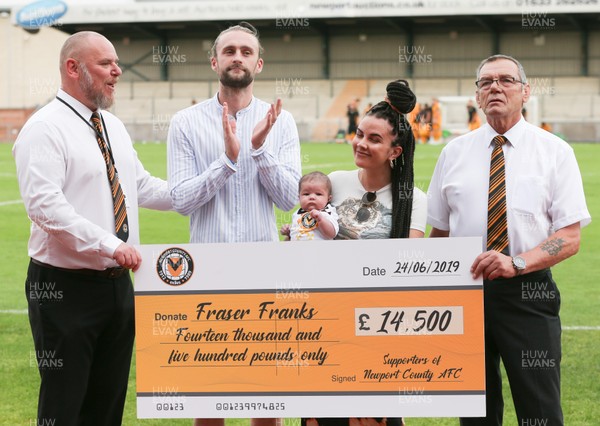240719 - Newport County v Chelsea U23s, Pre-season Friendly - Fraser Franks, wife Stacey and daughter Nellie receive a cheque from the club before the start of the match
