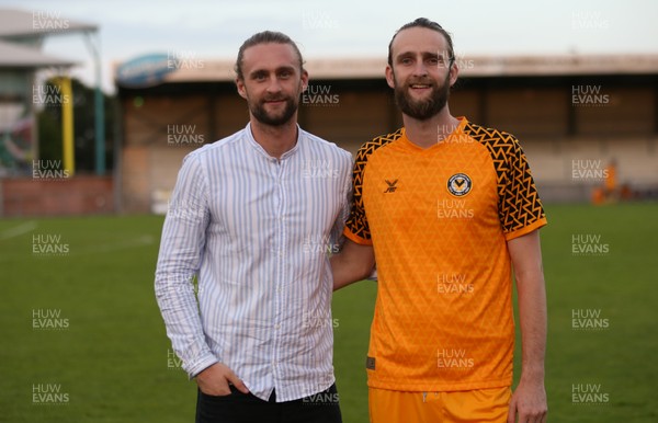 240719 - Newport County v Chelsea U23s, Pre-season Friendly - Former Newport County player Fraser Franks, left, who was forced to retire with a heart condition, with his brother George who played as a special replacement towards the end of the match