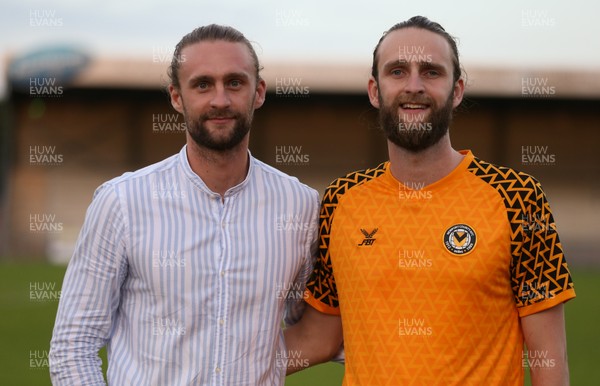240719 - Newport County v Chelsea U23s, Pre-season Friendly - Former Newport County player Fraser Franks, left, who was forced to retire with a heart condition, with his brother George who played as a special replacement towards the end of the match