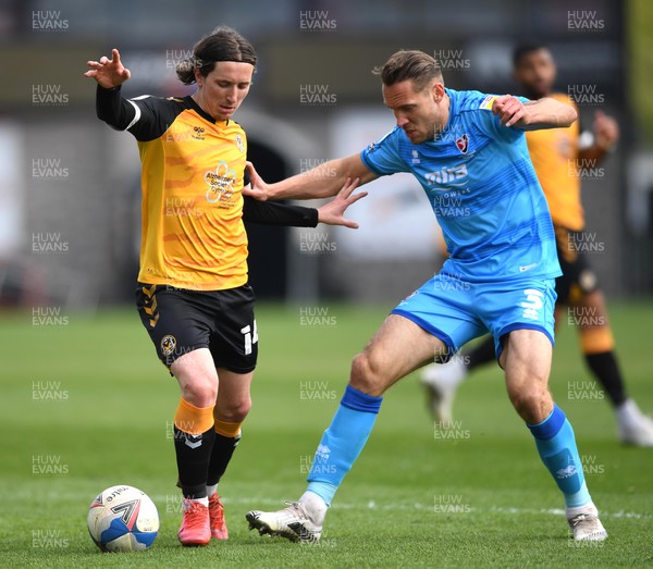 010521 - Newport County v Cheltenham Town - SkyBet League 2 - Aaron Lewis of Newport County is tackled by Chris Hussey of Cheltenham Town