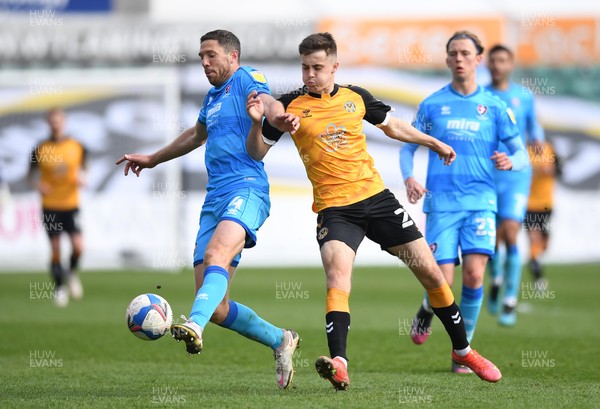 010521 - Newport County v Cheltenham Town - SkyBet League 2 - Ben Tozer of Cheltenham Town is tackled by Lewis Collins of Newport County
