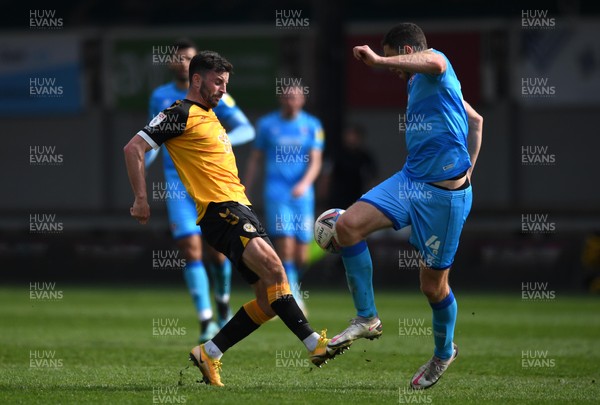 010521 - Newport County v Cheltenham Town - SkyBet League 2 - Padraig Amond of Newport County is tackled by Ben Tozer of Cheltenham Town