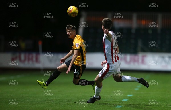 071117 - Newport County v Cheltenham Town - Checkatrade Trophy - Tom Hillman of Newport County is challenged by Daniel O'Shaughnessy of Cheltenham Town