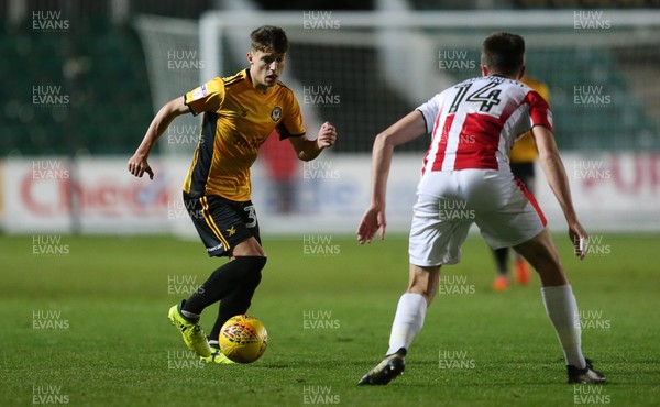 071117 - Newport County v Cheltenham Town - Checkatrade Trophy - Tom Hillman of Newport County is challenged by Daniel O'Shaughnessy of Cheltenham Town