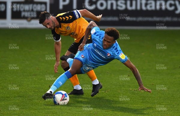080920 - Newport County v Cheltenham Town - EFL Trophy - Elliot Bonds of Cheltenham Town is tackled by Padraig Amond of Newport County