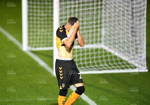 080920 - Newport County v Cheltenham Town - EFL Trophy - Lewis Collins of Newport County at the end of the game