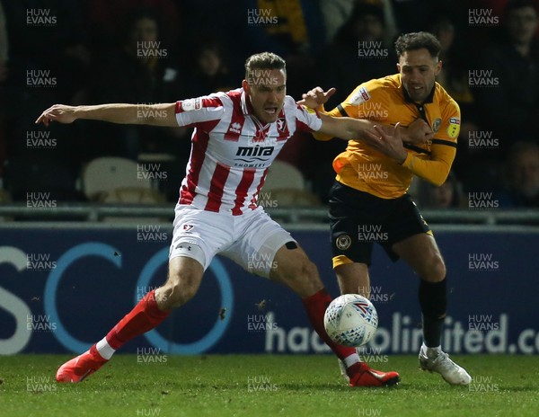 150319 - Newport County v Cheltenham Town, SkyBet League 2 - Robbie Willmott of Newport County and Chris Hussey of Cheltenham Town compete for the ball