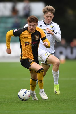 181025 - Newport County v Cheltenham Town - Sky Bet League 2 - Michael Spellman of Newport County is challenged by Jordan Thomas of Cheltenham Town