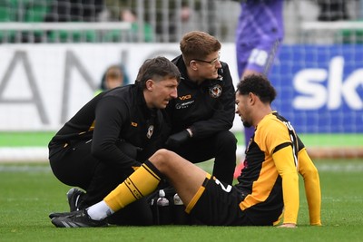 181025 - Newport County v Cheltenham Town - Sky Bet League 2 - Jaden Warner of Newport County goes down with an injury 