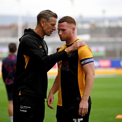181025 - Newport County v Cheltenham Town - Sky Bet League 2 - Newport County Manager, David Hughes with Lee Jenkins of Newport County before kick off