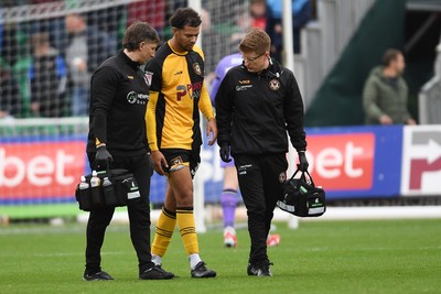 181025 - Newport County v Cheltenham Town - Sky Bet League 2 - Jaden Warner of Newport County leaves the field after picking up an injury