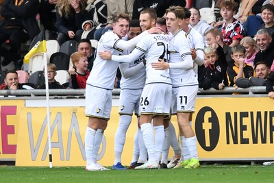 181025 - Newport County v Cheltenham Town - Sky Bet League 2 - Luke Young of Cheltenham Town celebrates scoring a goal with team mates