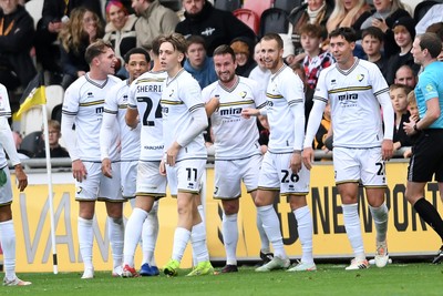 181025 - Newport County v Cheltenham Town - Sky Bet League 2 - Luke Young of Cheltenham Town celebrates scoring a goal with team mates