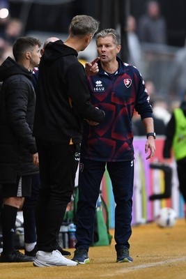 181025 - Newport County v Cheltenham Town - Sky Bet League 2 - Newport County Manager, David Hughes and  Steve Cotterill, Cheltenham Town Manager at full time