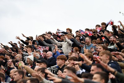 181025 - Newport County v Cheltenham Town - Sky Bet League 2 - Cheltenham fans celebrate the win at full time