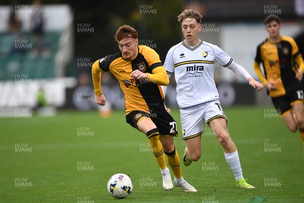 181025 - Newport County v Cheltenham Town - Sky Bet League 2 - Michael Spellman of Newport County is challenged by Jordan Thomas of Cheltenham Town