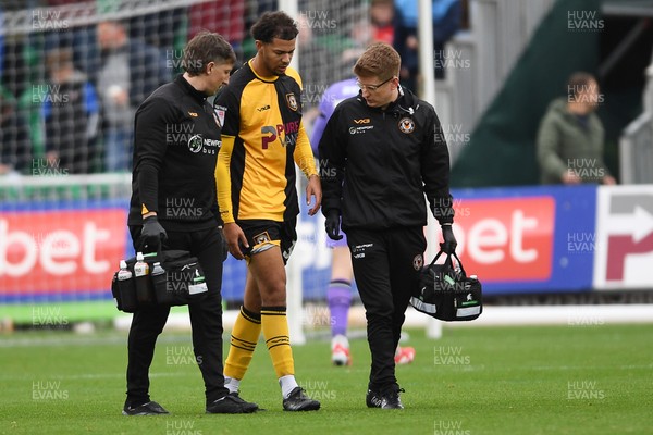 181025 - Newport County v Cheltenham Town - Sky Bet League 2 - Jaden Warner of Newport County leaves the field after picking up an injury