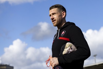 220225 - Newport County v Cheltenham Town - Sky Bet League 2 - Scott Bennett of Cheltenham Town arrives ahead of the match