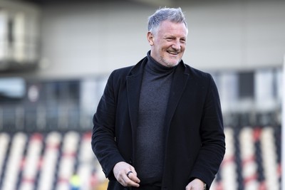 220225 - Newport County v Cheltenham Town - Sky Bet League 2 - Wales u17 head coach Wayne Hatswell arrives ahead of the match