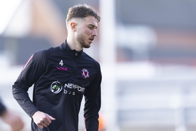 220225 - Newport County v Cheltenham Town - Sky Bet League 2 - Matthew Baker of Newport County during the warm up