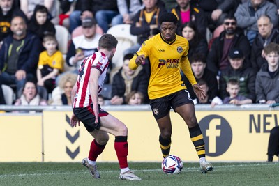 220225 - Newport County v Cheltenham Town - Sky Bet League 2 - Bobby Kamwa of Newport County in action