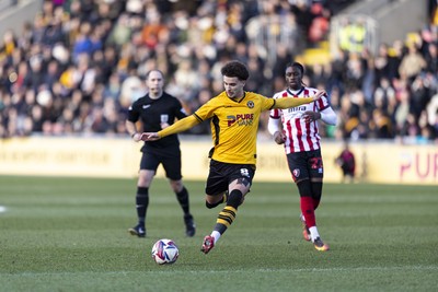 220225 - Newport County v Cheltenham Town - Sky Bet League 2 - Josh Martin of Newport County with a shot on goal