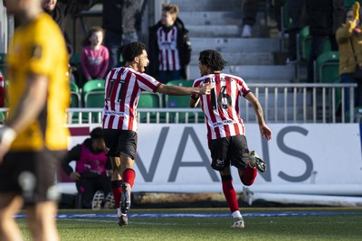 220225 - Newport County v Cheltenham Town - Sky Bet League 2 - Ethan Williams of Cheltenham Town celebrates scoring his sides second goal