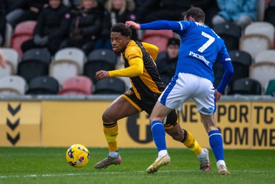 240126 - Newport County v Chesterfield - Sky Bet League 2 - Bobby Kamwa of Newport County takes on Liam Mandeville of Chesterfield