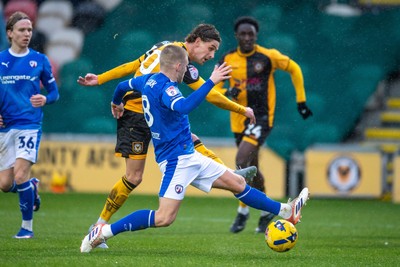 240126 - Newport County v Chesterfield - Sky Bet League 2 - Harrison Biggins of Newport County beats Ryan Stirk of Chesterfield