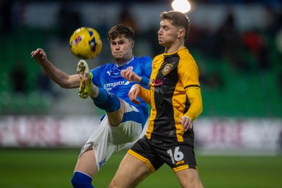 240126 - Newport County v Chesterfield - Sky Bet League 2 - James Crole of Newport County challenges Tom Pearce of Chesterfield