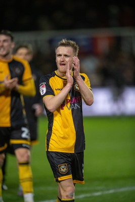 240126 - Newport County v Chesterfield - Sky Bet League 2 - Matthew Smith of Newport County applauds the fans