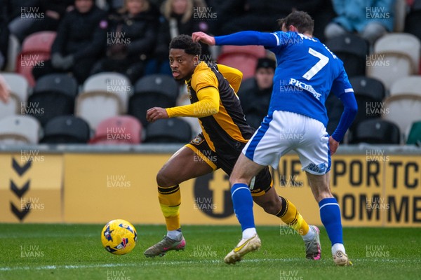 240126 - Newport County v Chesterfield - Sky Bet League 2 - Bobby Kamwa of Newport County takes on Liam Mandeville of Chesterfield