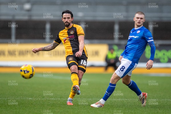 240126 - Newport County v Chesterfield - Sky Bet League 2 - Liam Shephard of Newport County beats Ryan Stirk of Chesterfield